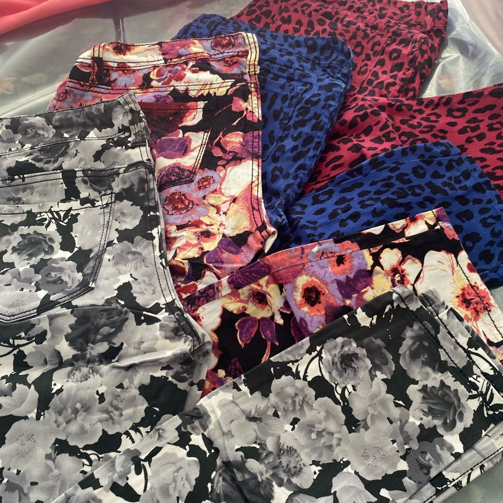 4 Pairs of five pocket jean leggings.